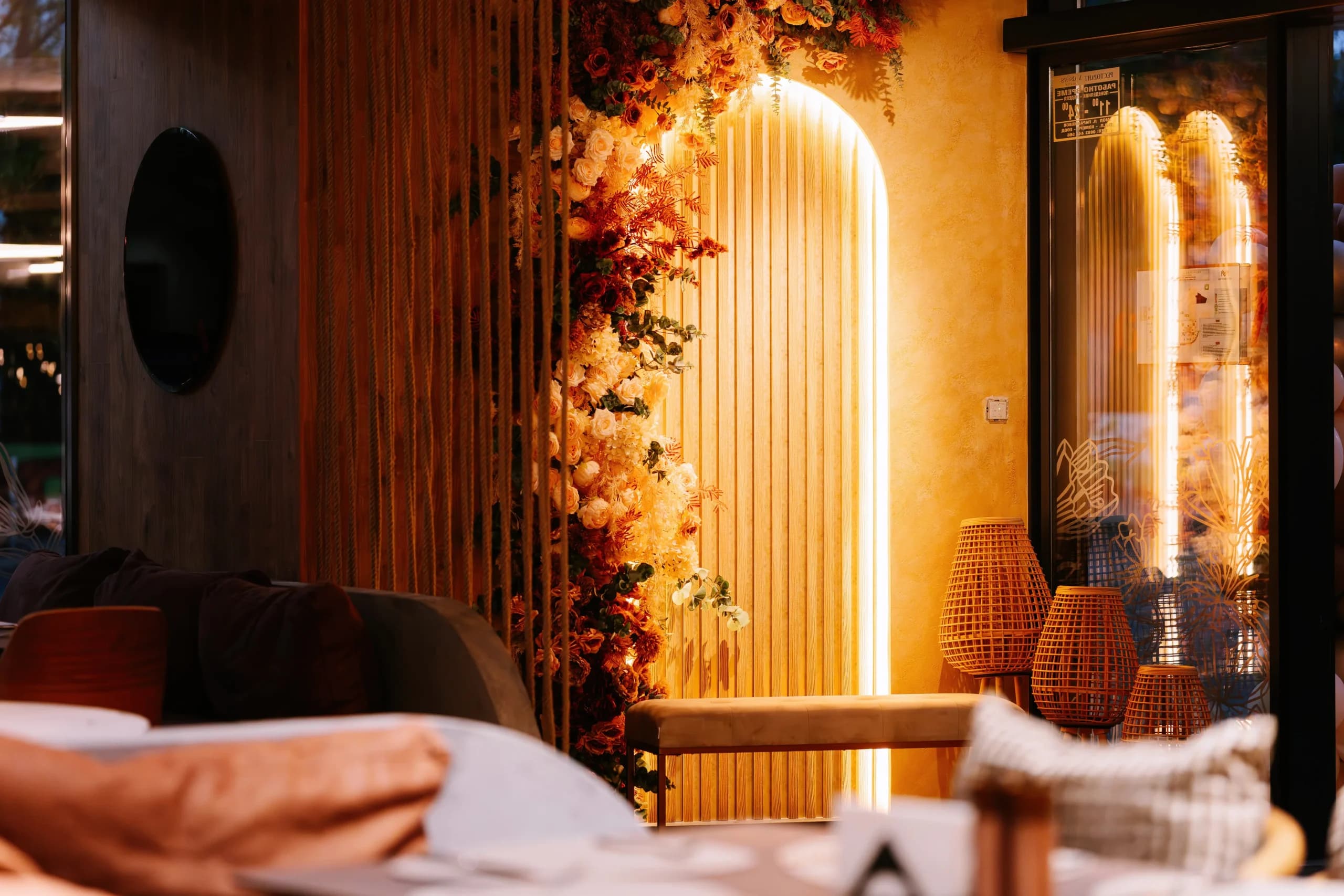 Ambra Restaurant Interior with warm amber lighting and natural textures